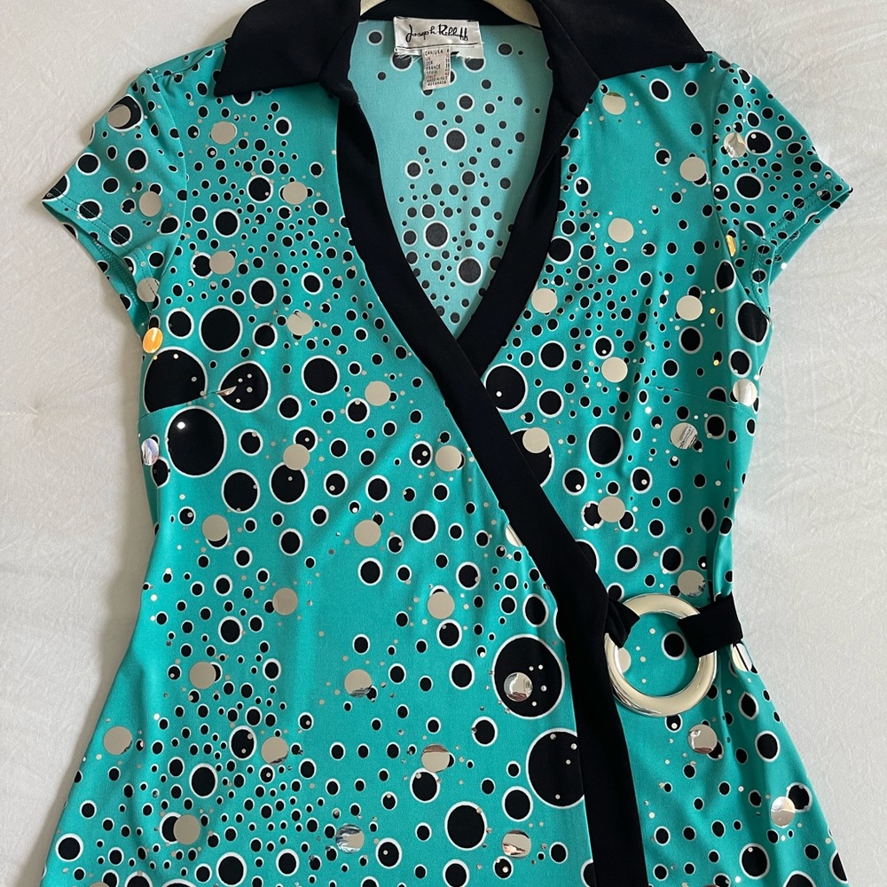 Foiled top purchased in Vegas Casino.  Never worn.